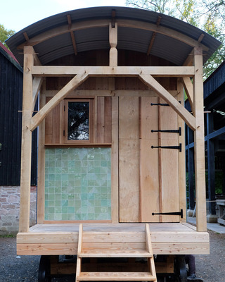 Glazed Moss tiles on Shepherds hut, Natasha Russell in collaboration with Building Arts program students, Natasha Russell